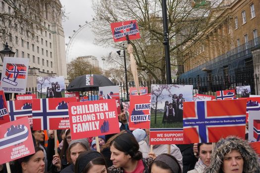 UNITED KINGDOM, London: Protesters hold placards reading Children belong to the family or Norway, return the children to Bodnariu family during a demonstration to condemn legal kidnapping in Norway, in London, UK, on April 16, 2016. 