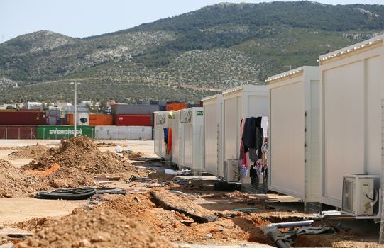 GREECE, Athens: The rolling hillsides of Greece west of Athens are the backdrop to Skaramagas camp, just off the Gulf of Eleusina on April 14, 2016.