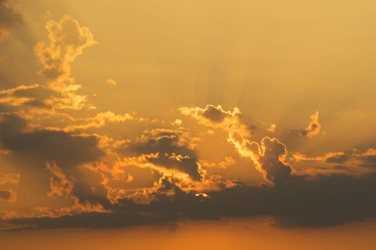 Orange sky with dark clouds