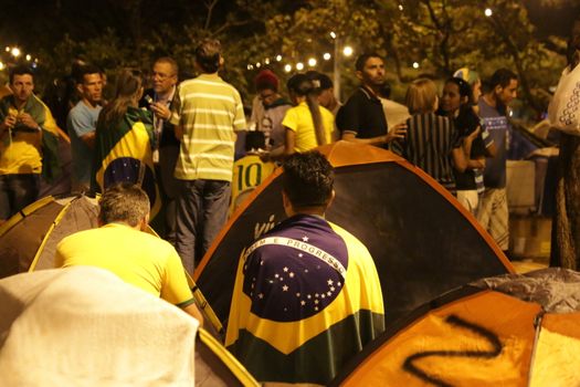 BRAZIL, Brasília : Activists supporting the impeachment of President Dilma Rousseff, set up camp in the Sarah Kubitschek City Park in Brasilia on April 16, 2016.Saturday was the second day of the debate on the impeachment of President Dilma Rousseff in Brazil's lower house of Congress, ahead of a Sunday vote on whether or not to pursue the process. 