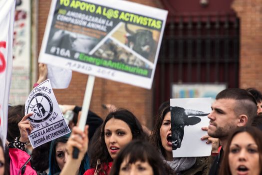 SPAIN, Madrid : Protesters holding banners march during demonstration in support of pro-animal rights activists, in Madrid on April, 16, 2016. 