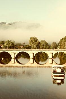 Morning Mist in the French City of Terrasson, Vintage Style Toned Picture 