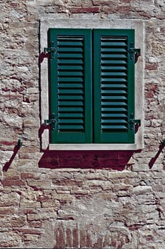 Italian Window with Closed Wooden Shutters, Vintage Style Toned Picture