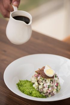 Traditional Russian kvass soup with vegetables - okroshka