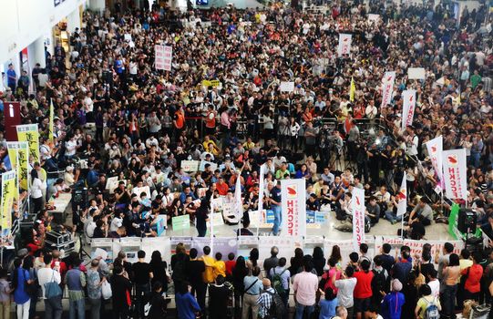 HONG KONG: Protesters gather during a protest organised by the Hong Kong Cabin Crew Federation at Hong Kong International Airport on April 17, 2016.More than 1,000 people protested at the city's airport on April 17 over an incident that saw the daughter of the city's leader had her forgotten hand baggage delivered to her at the restricted airport area.