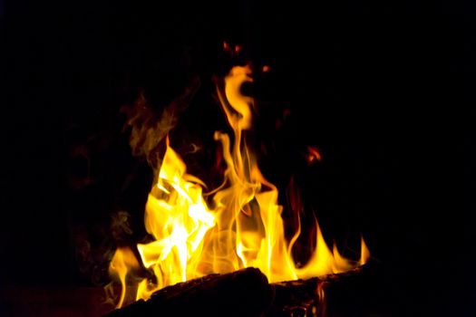 Photo of red fire flame on black background