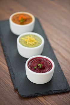 Refreshing lemon cranberry seabuckthorn sorbet at white bowl