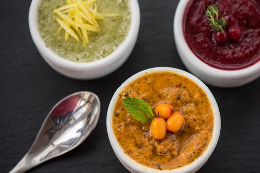 Refreshing lemon cranberry seabuckthorn sorbet at white bowl