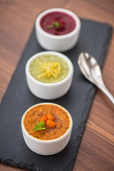 Refreshing lemon cranberry seabuckthorn sorbet at white bowl