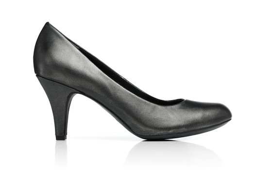 Ladies dark grey pump shoe isolated on white with reflection.