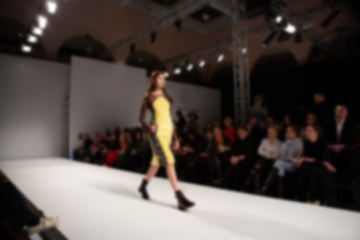 Fashion runway out of focus. The blur background