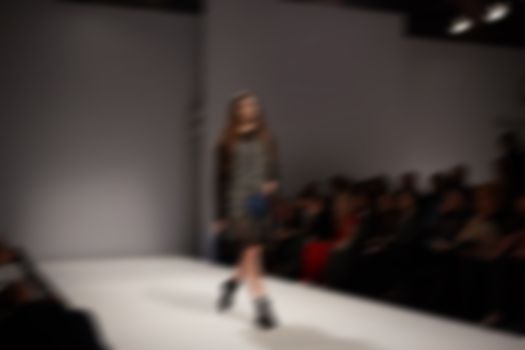 Fashion runway out of focus. The blur background