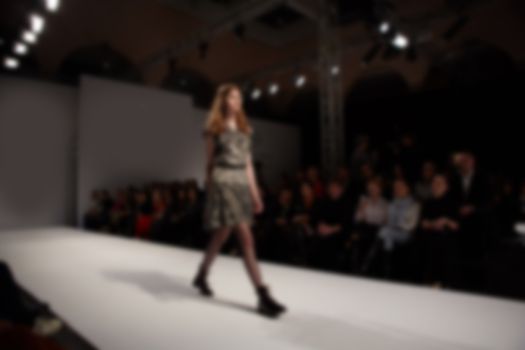 Fashion runway out of focus. The blur background