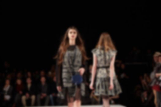 Fashion runway out of focus. The blur background