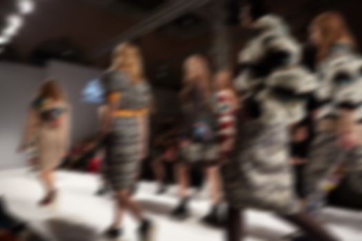 Fashion runway out of focus. The blur background