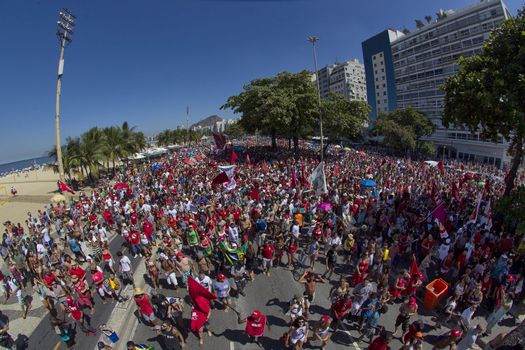 BRAZIL, Rio de Janeiro: Thousands of protesters rallied on Copacabana Beach in Rio de Janeiro, Brazil on April 17, 2016, against the impeachment of President Dilma Rousseff.Rousseff faces an impeachment vote today over charges of manipulating government accounts. Brazil's lower house is voting on whether to continue impeachment proceedings. 342 out of 513 votes are needed to continue the proceedings to the upper house.