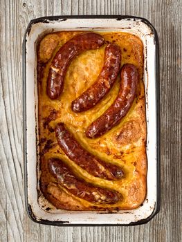 close up of rustic english pub grub toad in the hole