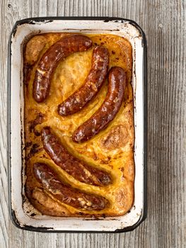 close up of rustic english pub grub toad in the hole