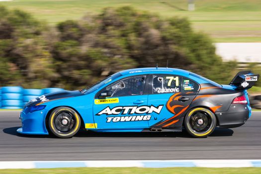 PHILLIP ISLAND, MELBOURNE/AUSTRALIA - 17 APRIL 2016: Dunlop Series race cars on turn 5 at Phillip Island.