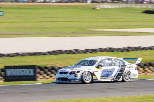 PHILLIP ISLAND, MELBOURNE/AUSTRALIA - 17 APRIL 2016: Dunlop Series race cars on turn 5 at Phillip Island.