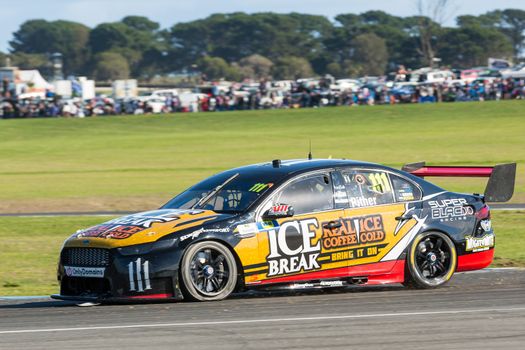 PHILLIP ISLAND, MELBOURNE/AUSTRALIA - 17 APRIL 2016: Superblack Racing Team's Chris Pither suffers a blowout on turn 4 at Phillip Island.