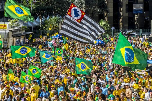 BRAZIl, Sao Paulo: Activists supporting the impeachment of President Dilma Rousseff take part in a protest in Sao Paulo, on April 17, 2016. Brazilian lawmakers on Sunday reached the two thirds majority necessary to authorize impeachment proceedings against President Dilma Rousseff. The lower house vote sends Rousseff's case to the Senate, which can vote to open a trial. A two thirds majority in the upper house would eject her from office. Rousseff, whose approval rating has plunged to a dismal 10 percent, faces charges of embellishing public accounts to mask the budget deficit during her 2014 reelection.