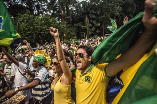 BRAZIl, Sao Paulo: Activists supporting the impeachment of President Dilma Rousseff take part in a protest in Sao Paulo, on April 17, 2016. Brazilian lawmakers on Sunday reached the two thirds majority necessary to authorize impeachment proceedings against President Dilma Rousseff. The lower house vote sends Rousseff's case to the Senate, which can vote to open a trial. A two thirds majority in the upper house would eject her from office. Rousseff, whose approval rating has plunged to a dismal 10 percent, faces charges of embellishing public accounts to mask the budget deficit during her 2014 reelection.