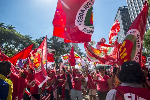 BRAZIL, Sao Paulo: Supporters of Brazilian President Dilma Rousseff demonstrate in Sao Paulo, before the voting of lawmakers at the Congress in Brasilia over the impeachment of Rousseff, on April 17, 2016. Brazilian lawmakers on Sunday reached the two thirds majority necessary to authorize impeachment proceedings against President Dilma Rousseff. The lower house vote sends Rousseff's case to the Senate, which can vote to open a trial. A two thirds majority in the upper house would eject her from office. Rousseff, whose approval rating has plunged to a dismal 10 percent, faces charges of embellishing public accounts to mask the budget deficit during her 2014 reelection.