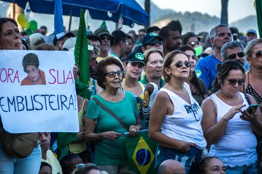 BRAZIL, Rio de Janeiro: People take part in a demonstration in favor of the impeachment of President Dilma Rousseff, in Copacabana, Rio de Janeiro, on April 17, 2016. Brazilian lawmakers on Sunday reached the two thirds majority necessary to authorize impeachment proceedings against President Dilma Rousseff. The lower house vote sends Rousseff's case to the Senate, which can vote to open a trial. A two thirds majority in the upper house would eject her from office. Rousseff, whose approval rating has plunged to a dismal 10 percent, faces charges of embellishing public accounts to mask the budget deficit during her 2014 reelection.