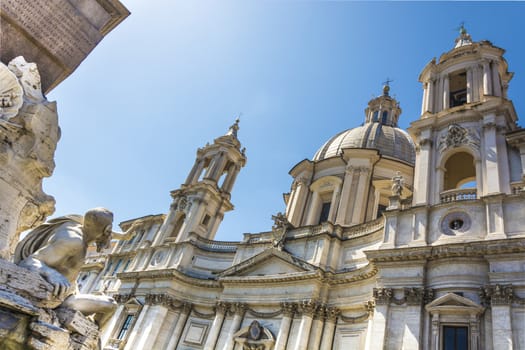 details of two roman baroque masterpiece: the four river fountain andhe the saint Agnese church in Piazza Navona in Rome