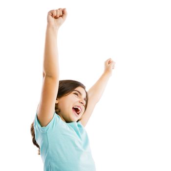 Studio portrait of a happy girl with arms raised on air