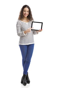 Beautiful and happy woman showing something on a tablet