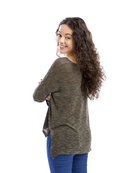 Studio portrait of a beautiful woman with arms crossed and looking back, isolated in white 