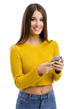 Beautiful girl sending a text message, isolated over white background