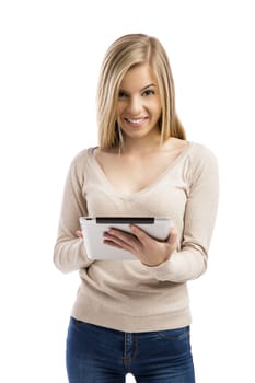 Beautiful and happy girl working with a tablet, isolated over white background 