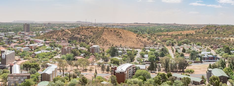 BLOEMFONTEIN, SOUTH AFRICA, DECEMBER 21, 2015: Panorama of Arboretum with Signal Hill and Happy Valley to its right as seen from Naval Hill.