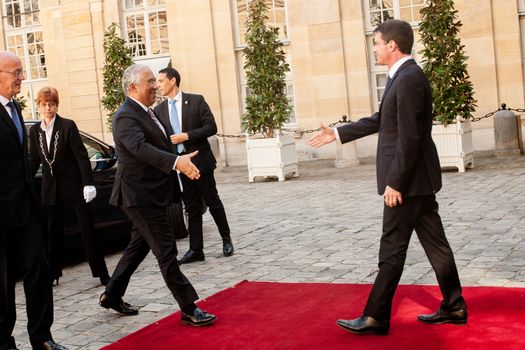 FRANCE, Paris : French Prime Minister Manuel Valls (R) welcomes his Portuguese counterpart Antonio Costa at the Hotel Matignon on April 18, 2016 in Paris. 