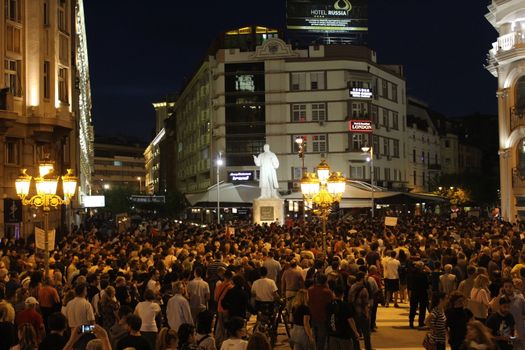 MACEDONIA, Skopje: Protesters fill the streets as demonstrations continue in Skopje, Macedonia on April 18, 2016. The protests began nearly one week ago, as protesters denounced the President Gjorge Ivanov's decision to halt probes into more than 50 public figures involved in a wiretapping scandal. Meanwhile, snap elections have been called for June 5.