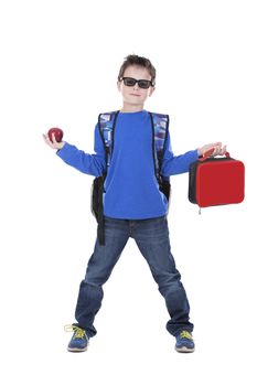 casual boy is holding an apple and school lunch on white background