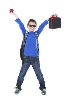 casual boy is holding an apple and school lunch on white background