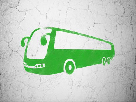 Vacation concept: Green Bus on textured concrete wall background