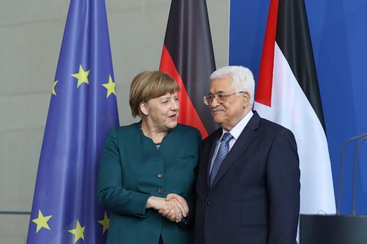 GERMANY, Berlin: German Chancellor Angela Merkel shakes hands with Palestinian President Mahmoud Abbas at the chancellery in Berlin on April 19, 2016.The meeting covered the bilateral relations of the nations, the developments in the Palestinian territories and the Middle East peace process. 