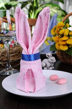 Festive table setting with Easter bunny napkin