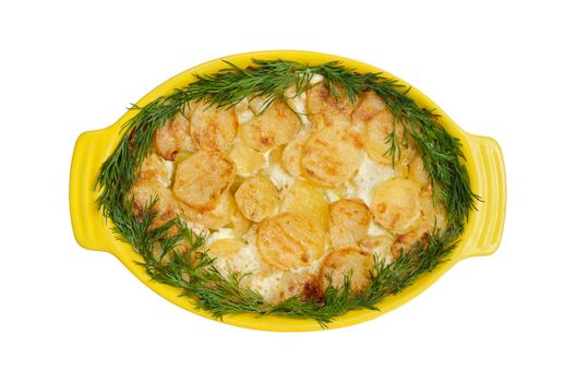 Potato slices with dill, baked in cream, isolated on white background