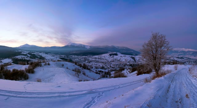 Carpathian mountain valley covered with fresh snow. Majestic landscape. Ukraine, Europe