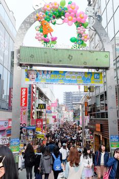 TOKYO, JAPAN - MARCH 30 2016: Takeshita Street(Takeshita Dori) in Harajuku. Takeshita Dori is considered a birthplace of Japan's fashion trends.