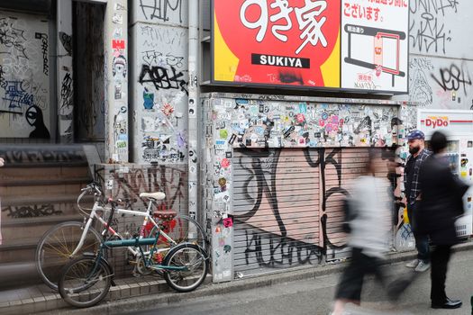 Tokyo, Japan - March 30, 2016 :Bumper stickers and graffiti on the street,Harajuku,Tokyo Japan.Harajuku is known as a center of Japanese youth culture and fashion.