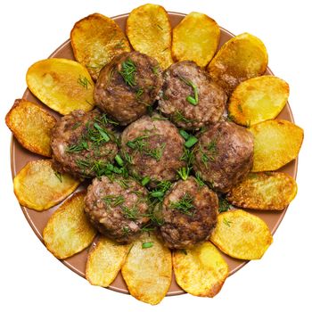Fried meatballs with rice and fries on a plate isolated on white background