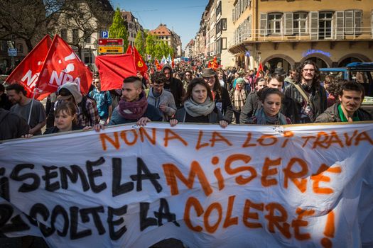 FRANCE, Strasbourg: Protesters hold a banner reading No to the Labour Law during a demonstration in Strasbourg, on April 20, 2016, against the French government's proposed labour law reforms. 