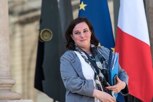 FRANCE, Paris : French housing minister Emmanuelle Cosse leaves the Elysee presidential Palace following the weekly cabinet meeting, on April 20, 2016 at in Paris. 